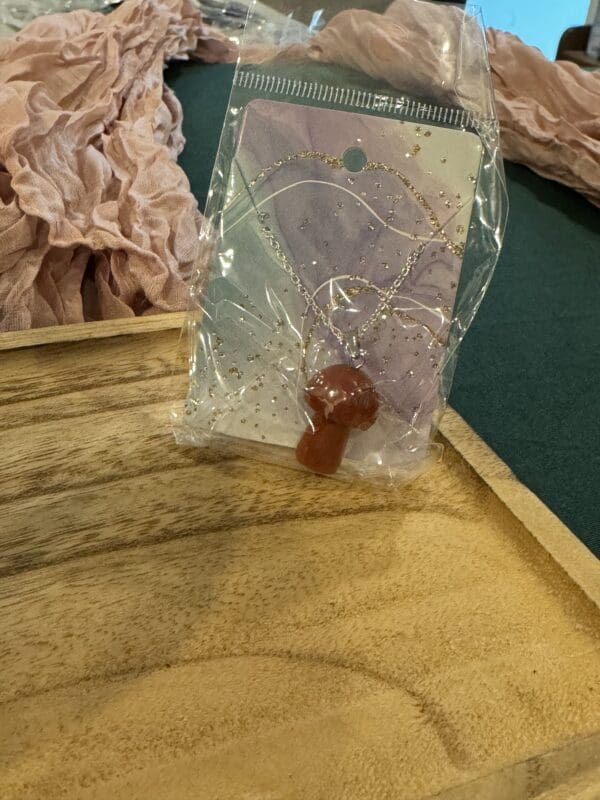 A bag of candy sitting on top of a wooden table.