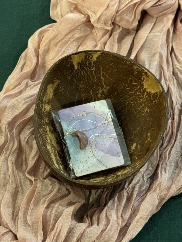 A bowl with a book inside of it