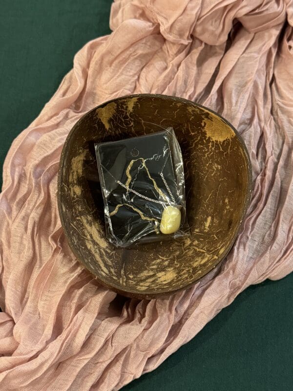 A bowl with a book inside of it