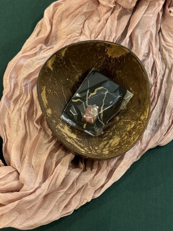 A bowl with a book inside of it