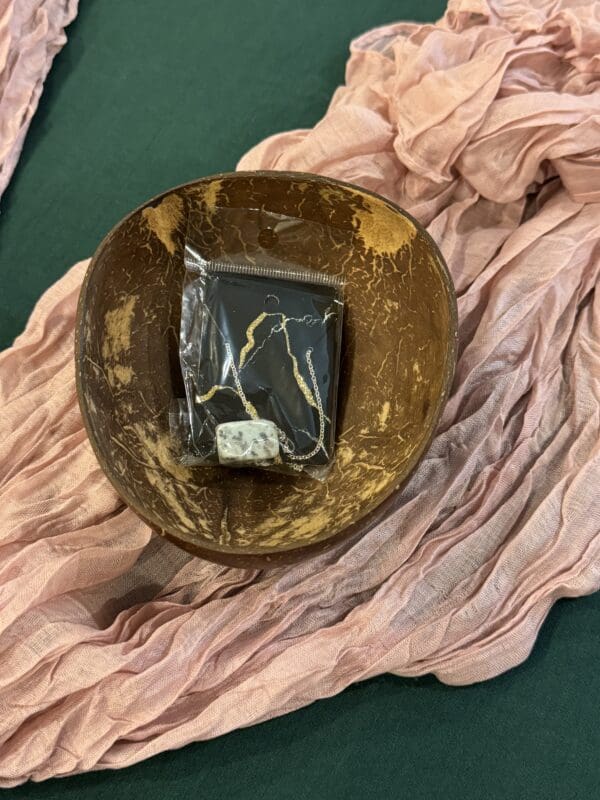 A bowl with a book inside of it