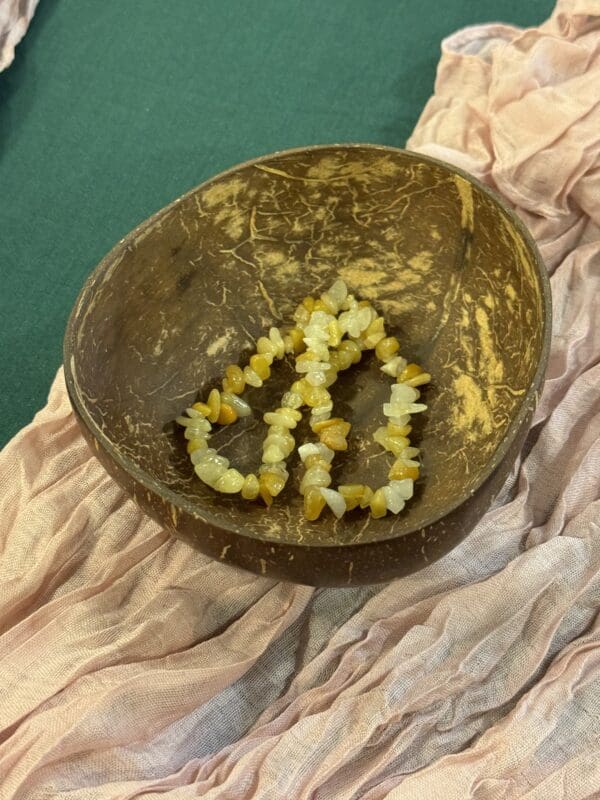 A bowl of food on top of a table.