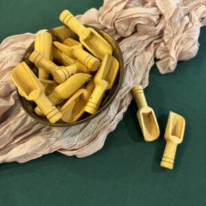 A bowl of pasta sitting on top of a table.