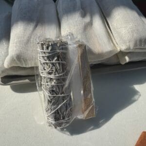 A bundle of silver thread sitting on top of a table.